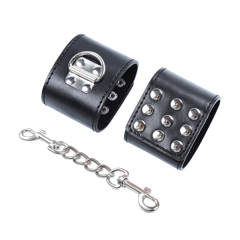 Manette polsiere in pelle con borchie metalliche e chiusura a scatto bondage 
